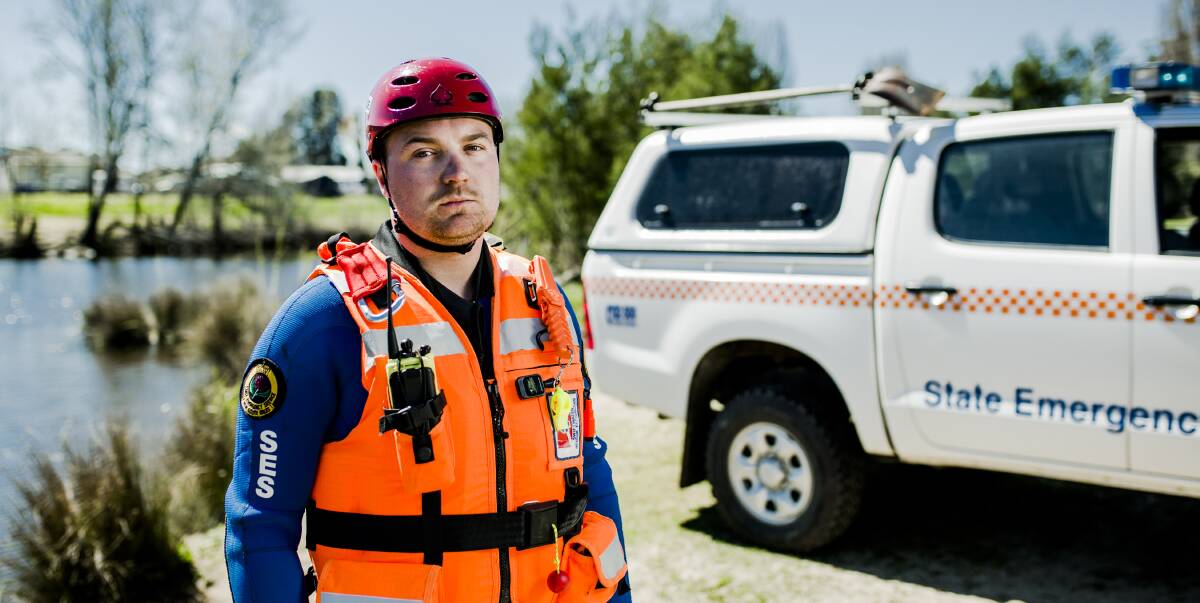 HERE TO HELP: The SES are helping with floods at Central West NSW and are also preparing for Thursdays bad weather in Queanbeyan. SES Swift Water Technician Michael Plumb. Photo: Jamila Toderas

