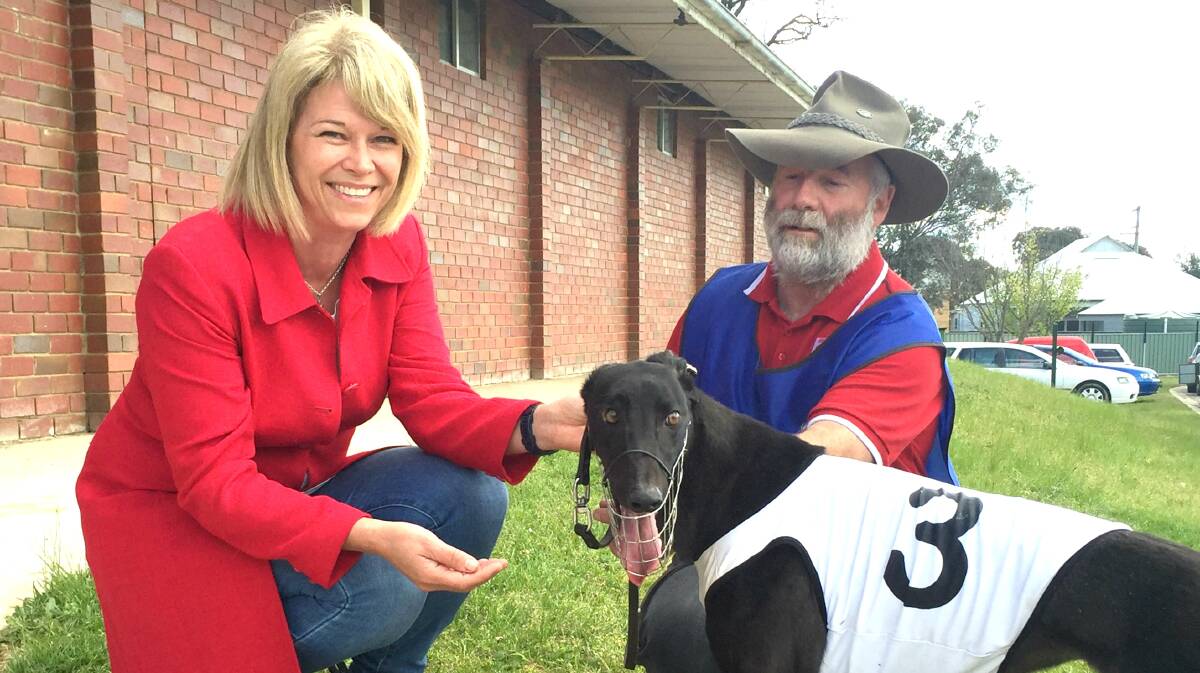 Katrina with Greg Katon, Jerrawa NSW and his greyhound Smooth Pearl at a recent meeting of the Young and District Greyhound Racing Club.
