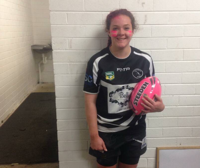 Pretty in Pink: Maddison Douven gets Man of the Match and receives the pink ball as trophy donated by the Ngunnawal Aboriginal Corporation. photo: Supplied. 