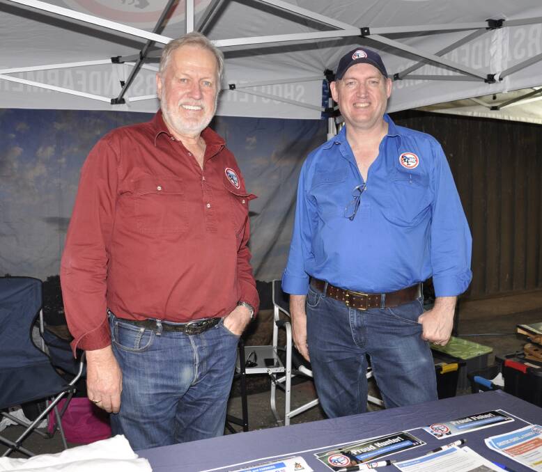 Cr Andy Wood says there's "no good reason for HumeLink." He's pictured with NSW Shooters, Fishers and Farmers leader, Robert Borsak, at this year's Goulburn Show. Picture by Louise Thrower.
