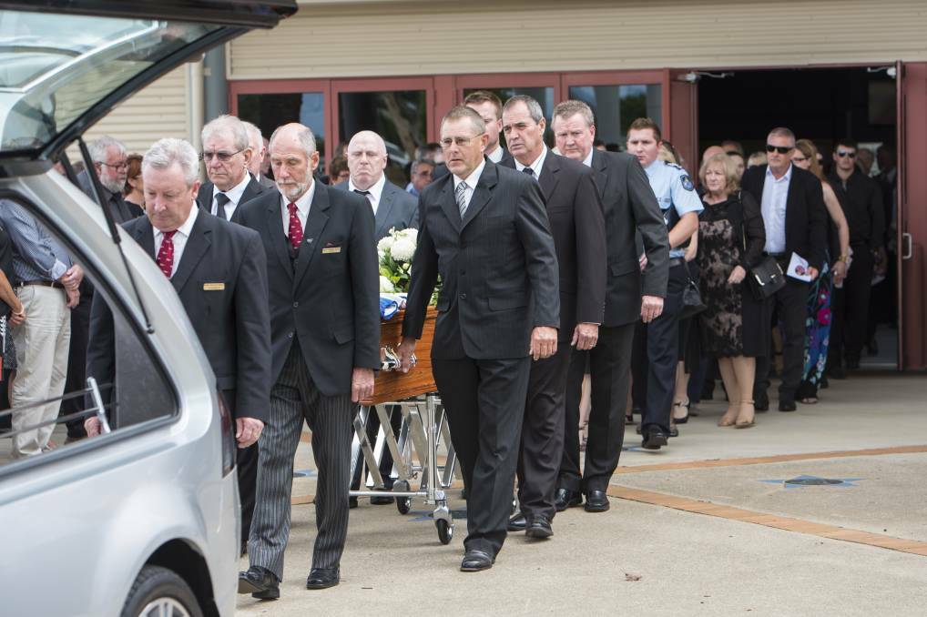 Hundreds of family, friends and former teammates packed out TREC on Tuesday to farewell sporting great, Michael Adams. Photo: Peter Hardin