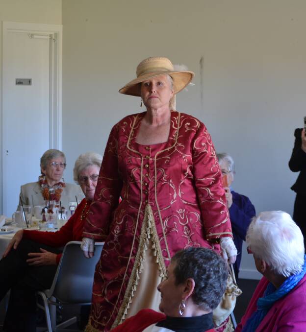 Don't leave your hats at the door: The gowns were often matched with decorative hats, often endowed with feathers or bows on top.