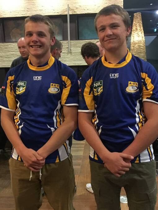 PROUD MOMENT: Tom Carey (left) and Connor Bush (right) receiving their ACT jumpers last week. Photo: Supplied.