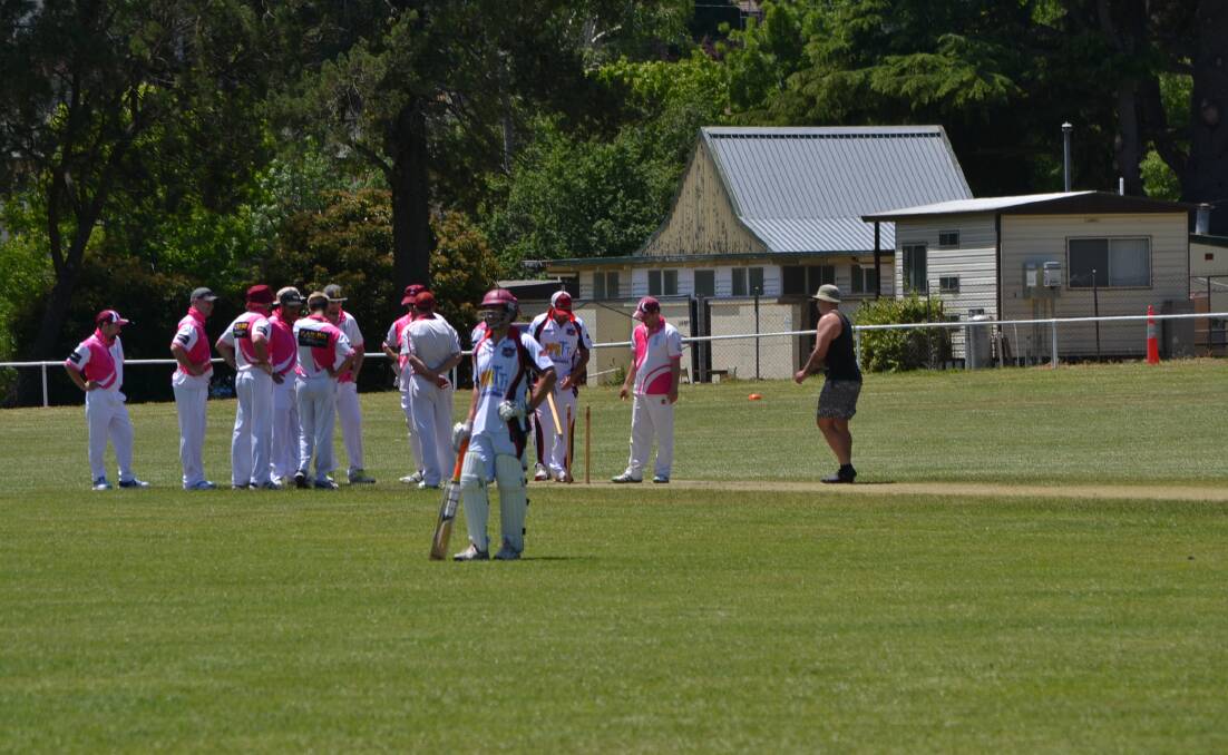 Another one down: The Piranhas replace the middle stump, which was uprooted as another wicket fell for the Pirates during their batting innings on Saturday, during which they made 74. Photo: Zac Lowe.