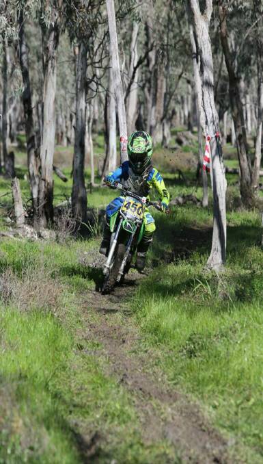 On the road again: Riley Arabin careening through the forest during one of his many competitions in 2016 competition. Photo: Supplied. 