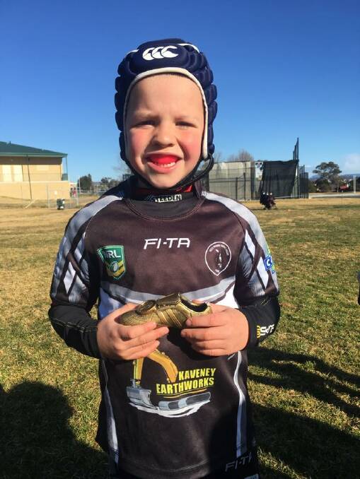 Big smile: Charlie Jamieson with his Player of the Week award, which he won thanks to his incredible pace and runs down the field. Photo: Yass Junior Rugby. 