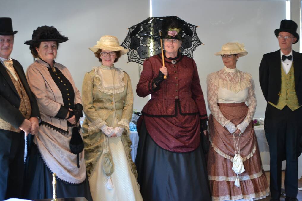 Form a line, please: The models take centre stage after the show for one last display of Victorian and Edwardian fashion. 