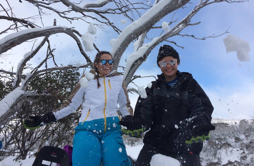 Snow and games: Bella Campbell (left) at a camp for CanTeen. Bella will be speaking at the Trivia Night. Photo: supplied.