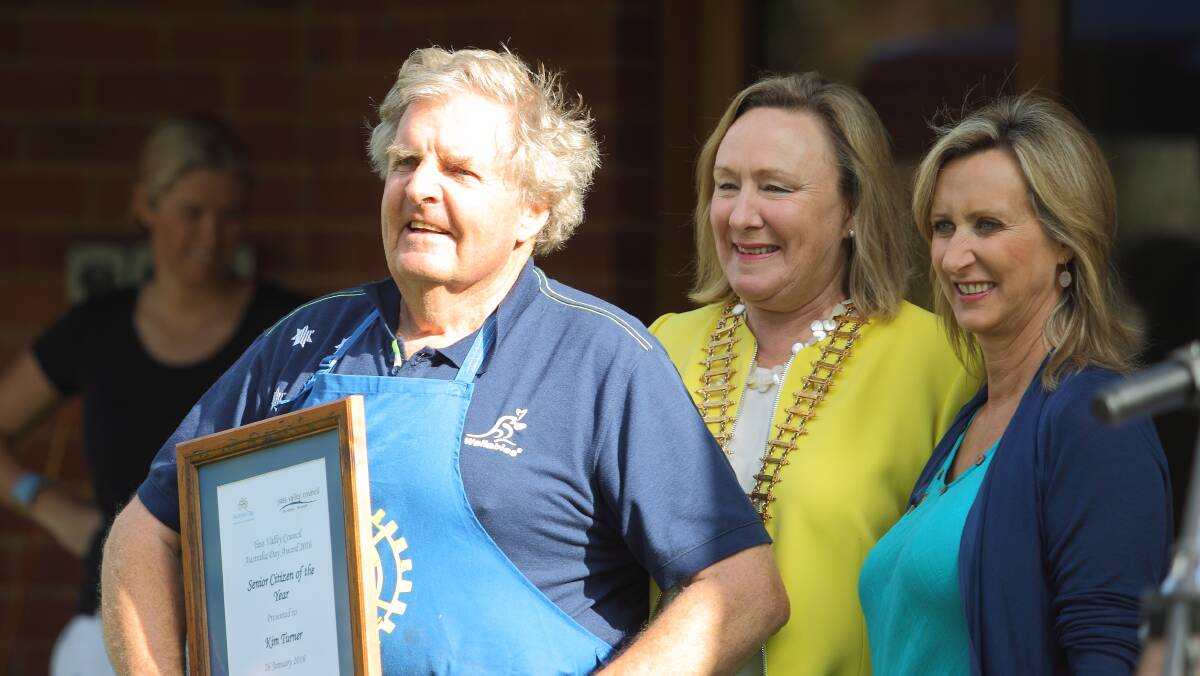 SPIRIT: Rotarian and deputy mayor Kim Turner received his Senior Citizen of the Year award on Australia Day last year, complete with his BBQ apron. Photo: RS Williams.