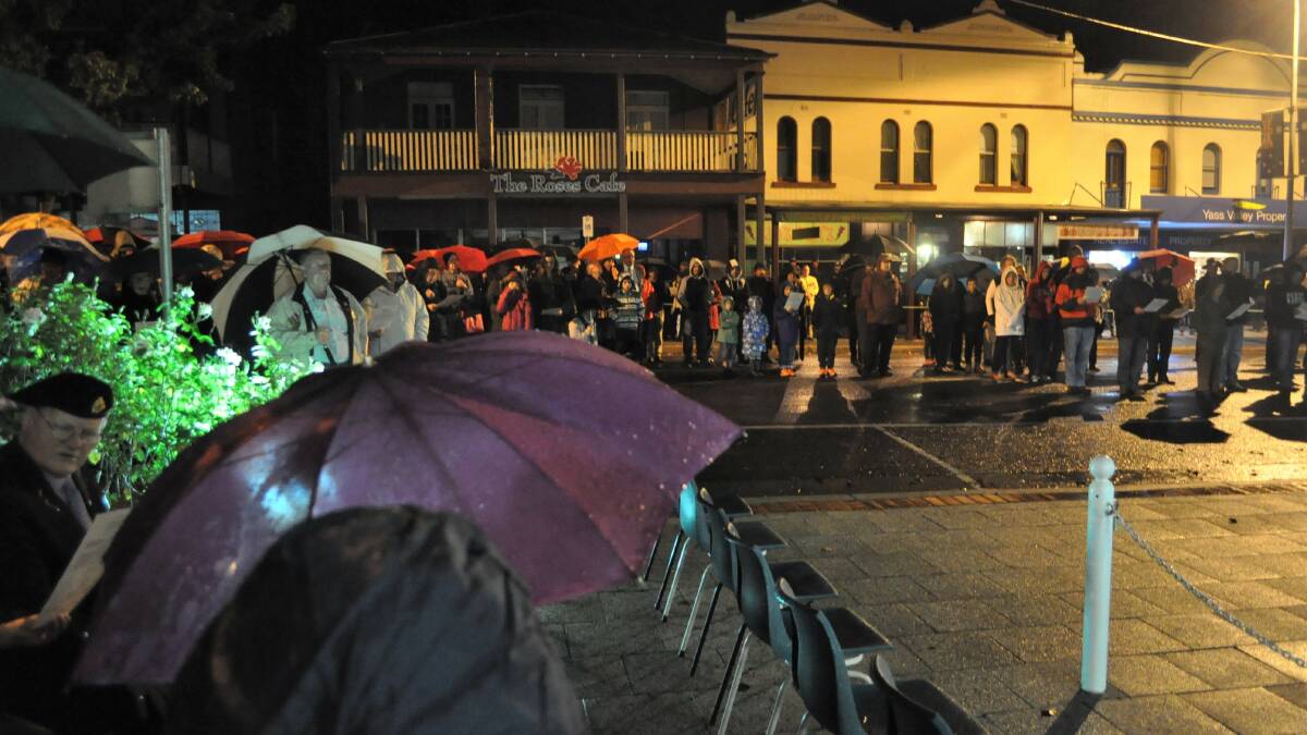 STRONG TURNOUT: Rain did not deter more than 100 Yass Valley community members from attending the 2017 Anzac Day dawn service on April 25. Photo: Toby Vue