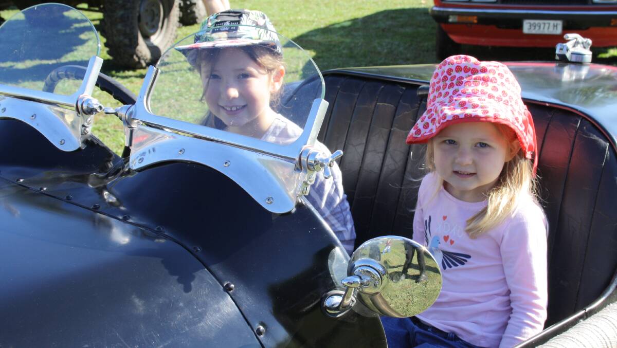 PIC OF THE WEEK: Alexis and Tessa from Yass take a ride in a 1936 Armstrong Sideley from the Yass Antique Motor Club at the show on Sunday. Photo: Alix Douglas.
