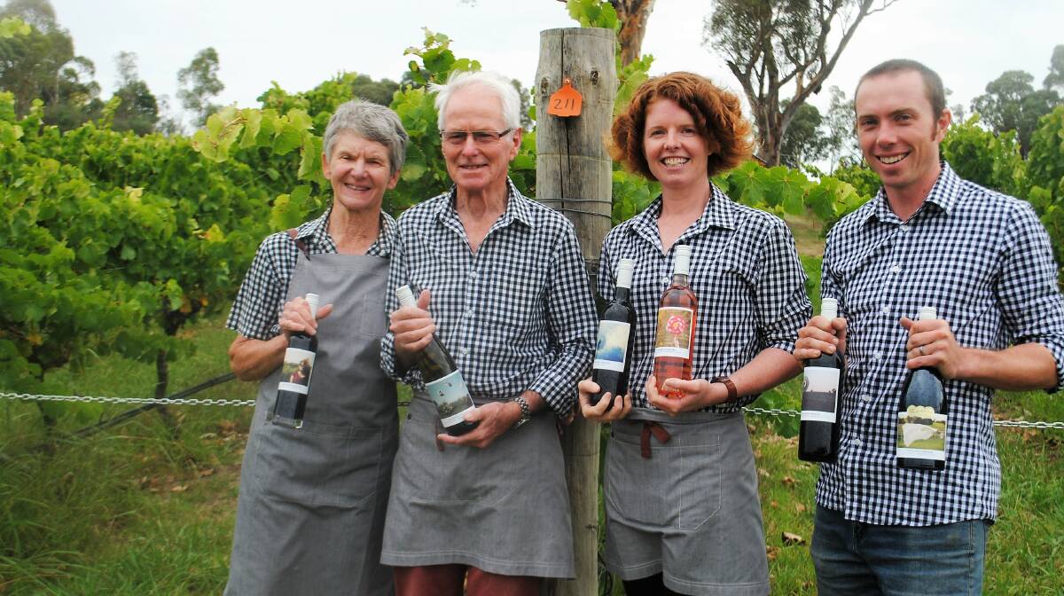 ON TOP OF THE WORLD: Four Winds Vineyard owners Suzanne and Graeme Lunney with Sarah and John Collingwood, thrilled with the international award. Photo: Alix Douglas