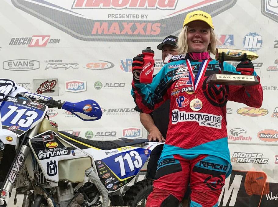 DOMINANT: Tayla Jones, who moved to the United States in early 2017, with her latest trophy for another victory in the GNCC competition. Photo: Tayla Jones