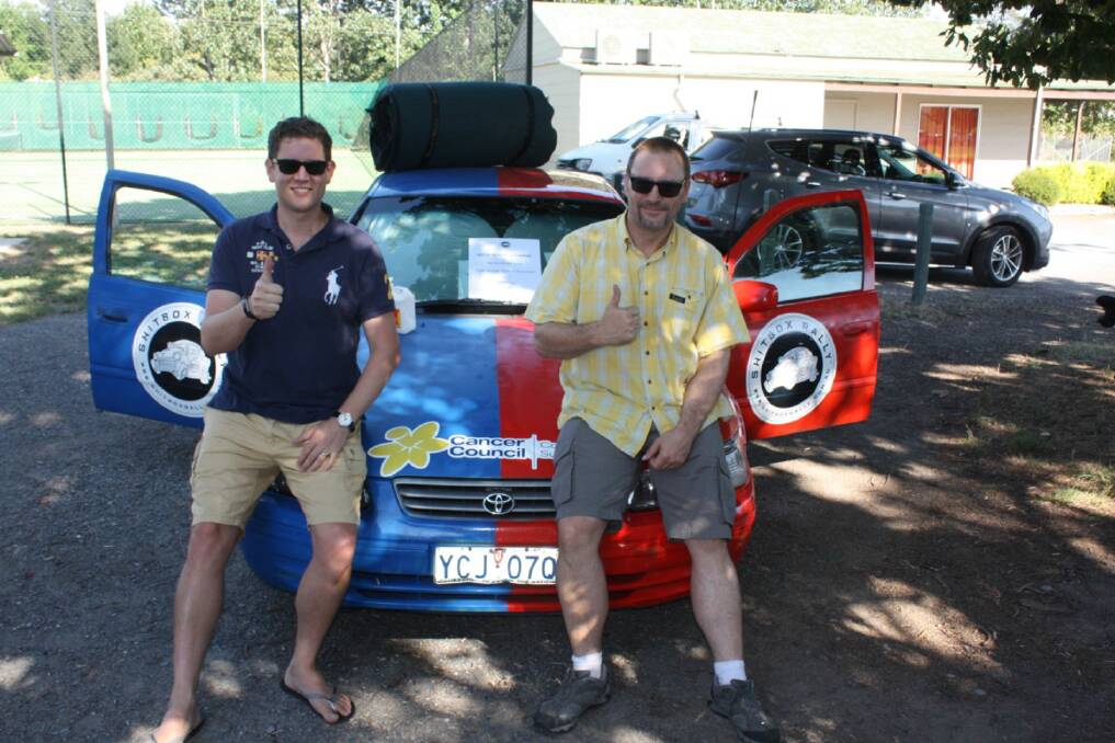 Behind the wheel: Yass resident Nick Tyrrell and friend Paul Kindermann are among those travelling the extra distance in a car rally for cancer. Photo: Jessica Cole.
