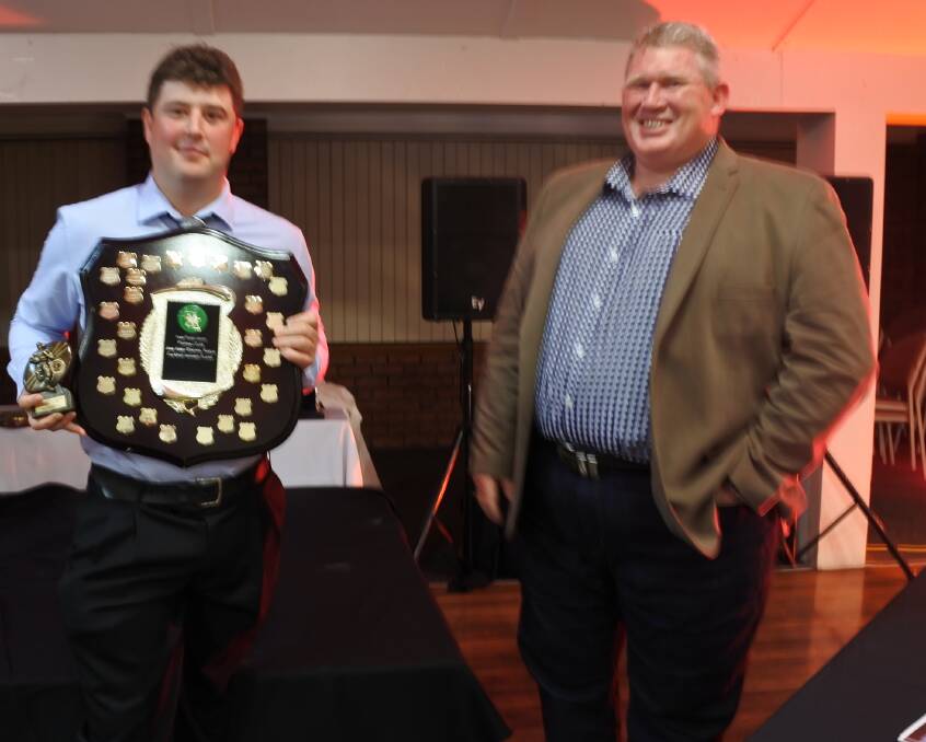 Ryan Greenwood: recipient of The John Abbey Memorial Trophy for most improved player in a backs positio, presented by coach Lance Wellington. Photo: Toby Vue.