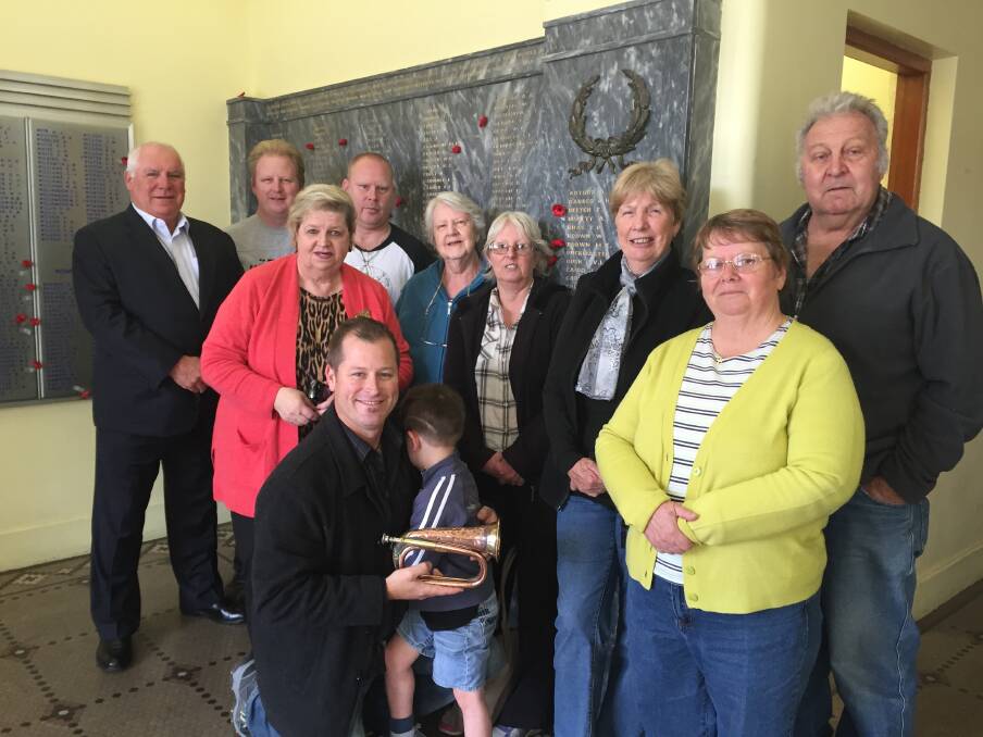 History returns homes: Three generations of the Hattersley family made the four-hour journey to the Yass Valley Region to present the piece of lost history to the Yass and District Historical Society. Photo: Jessica Cole