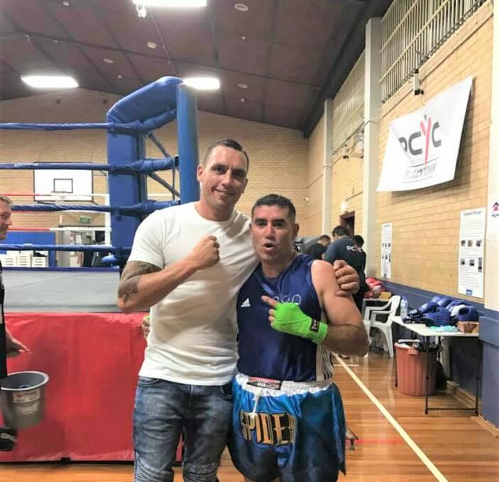 VICTORY: Spider (right) with Nathan Merritt (whom Spider also trains) at the NSW Masters Boxing, Blacktown PCYC. Spider secured the win on the night, February 18, after 16 years in retirement. Photo: Nathan Merritt.