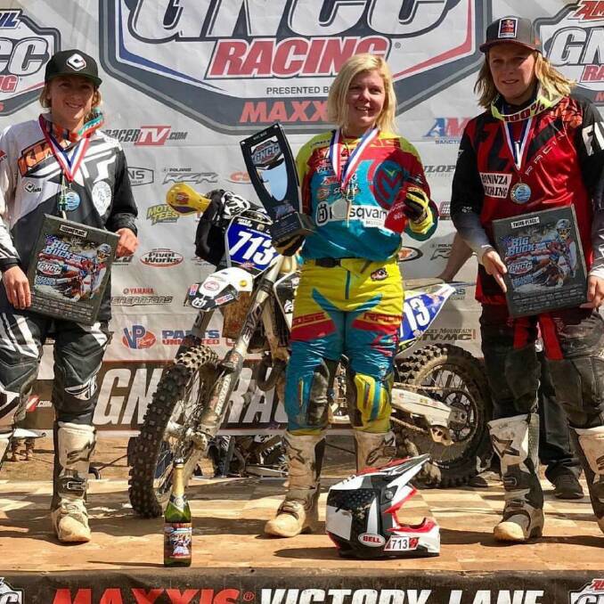 BLISTERING START: Yass motorsports star Tayla Jones (centre) presented with more silverware after another win. Her success rate is now two from two. Photo: Tayla Jones.