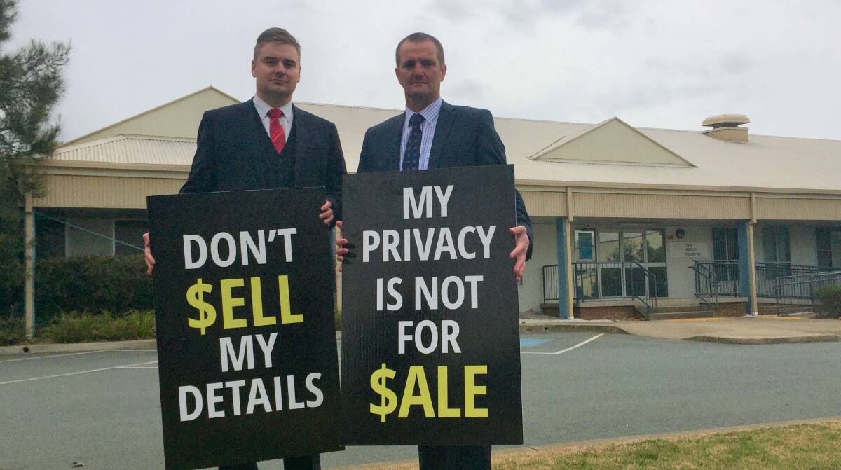 PRIVATISATION CONCERNS: Brendan Forde, president of the Goulburn State Electorate Council for the ALP, alongside Clayton Barr MP outside the Yass Motor Registry. Photo: Toby Vue.