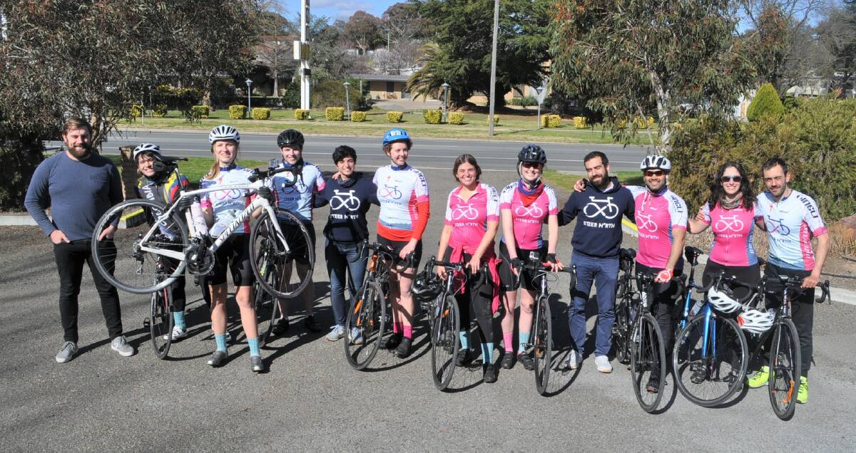 Pastor Nick Barber (far left) with the cyclists from Steer North. Photo: Toby Vue