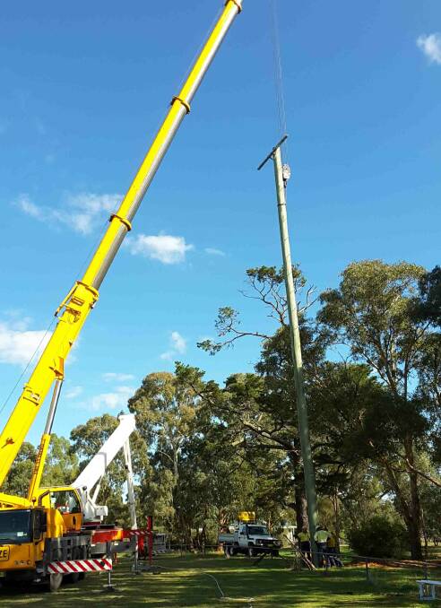 Installation of one of the training lights. Photo: Yass Valley Council
