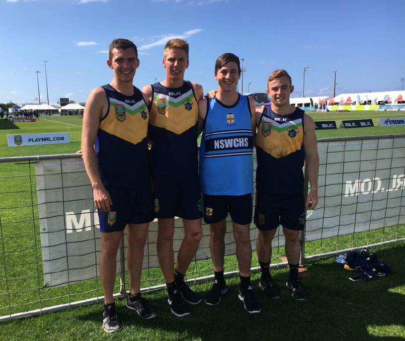 Well represented: Ryan Forlonge, Adam Bell, Billy Beck and Benjamin Wylie catch up at the tournaments on the Sunshine Coast. Photo: Yass Touch Football Association