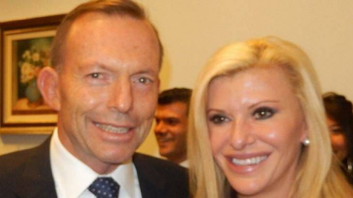 Tony Abbott and <i>Real Housewives of Melbourne</i> star Gamble Breaux meet on budget night in Canberra. Photo: Instagram 