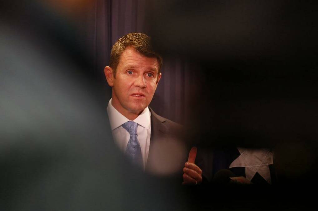 NSW Premier Mike Baird, in Sydney on Wednesday, has rushed through legislation heading off court orders that would have overturned corruption findings against mining mogul Travers Duncan and associates. Photo: Peter Rae