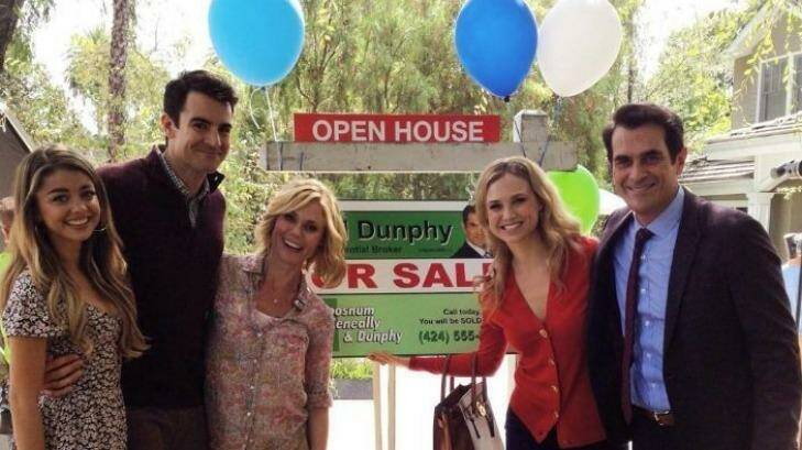 Lookalikes: Ben Lawson, second from left, in a scene from Modern Family.