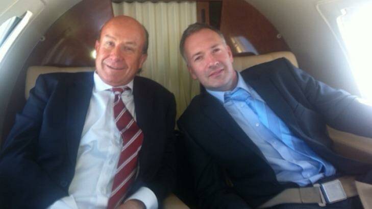 Former NewSat CEO Adrian Ballintine in corporate jet with the CFO of his yacht company, Jason Cullen.