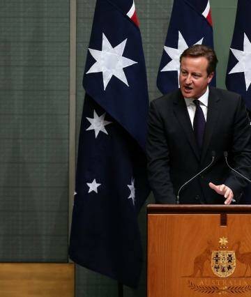 David Cameron, pictured addressing the Australian Parliament last year, has revealed he is distantly related to Kim Kardashian. Photo: Alex Ellinghausen