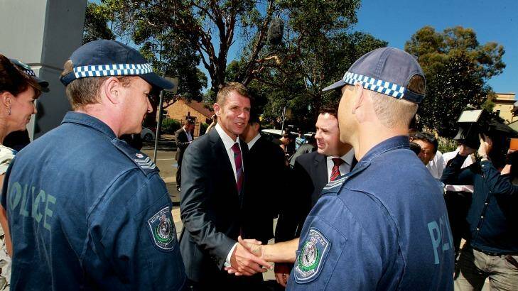 'We are coming after you': NSW Premier Mike Baird was at Granville police station to announce tough new rules to combat organised crime. Photo: Ben Rushton