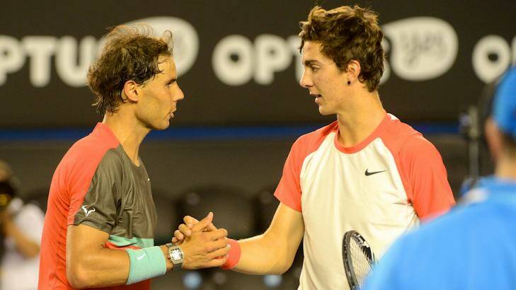 Outclassed: Thanasi Kokkinakis shakes hands after losing to Rafael Nadal at the Australian Open in January. Photo: Pat Scala