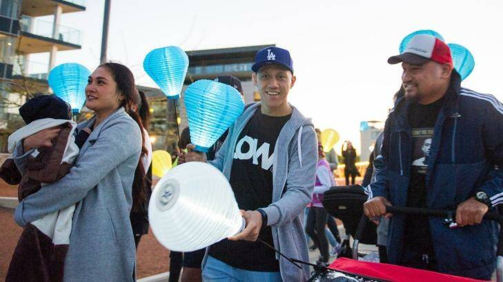 Christian Lealiifano rallies around friends family and the 1000s of supporters at the Canberra Leukaemia Foundation Light the Night walk. Photo: Jay Cronan