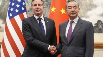 Antony Blinken (left) and Chinese counterpart Wang Yi are working to mend strained diplomatic ties. (AP PHOTO)
