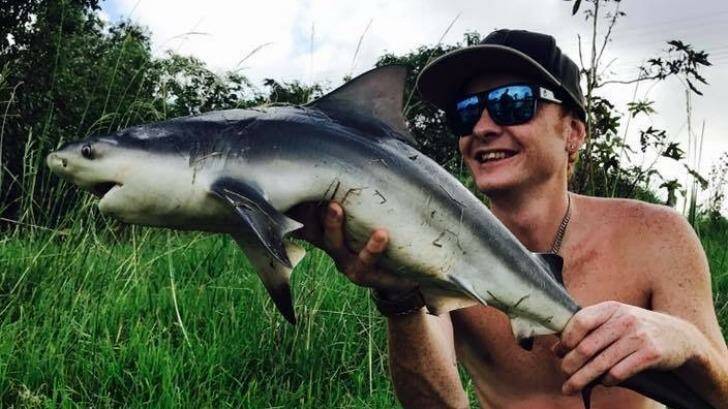 Jamie Leeder with a bull shark caught earlier this year, one of the many he and Jarrad Smith have caught. Photo: Supplied