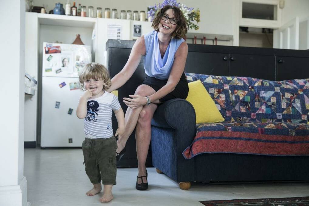 Solicitor and reformed drug user, Edwina Lloyd, the Labor candidate for the state seat of Sydney, at her Potts Point home with her son, Ryder, 20 months.  Photo: Nic Walker