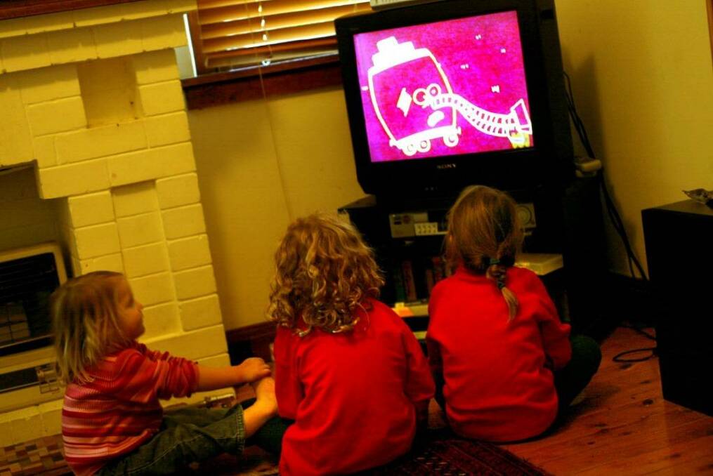 Screen time: Children are easily drawn into cartoon worlds, but is that harmful? Photo: Louise Kennerley  