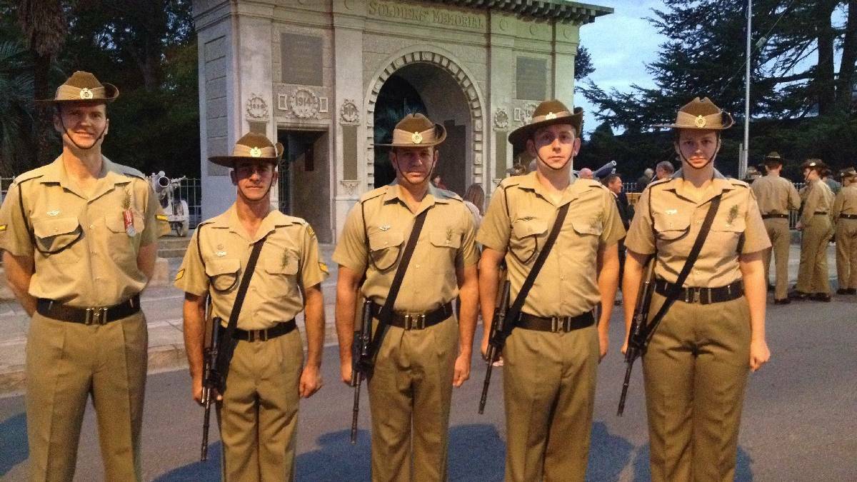 BEGA: The catafalque party from 4 Combat Engineers Squadron 5 Engineers Regiment (from left) Lance Corporal Gordon, Corporal Perry, Sapper Mayo, Sapper McFarlane-Roberts and Sapper Lippmeier at the Bega Anzac Day dawn service. Photo: The Bega District News.