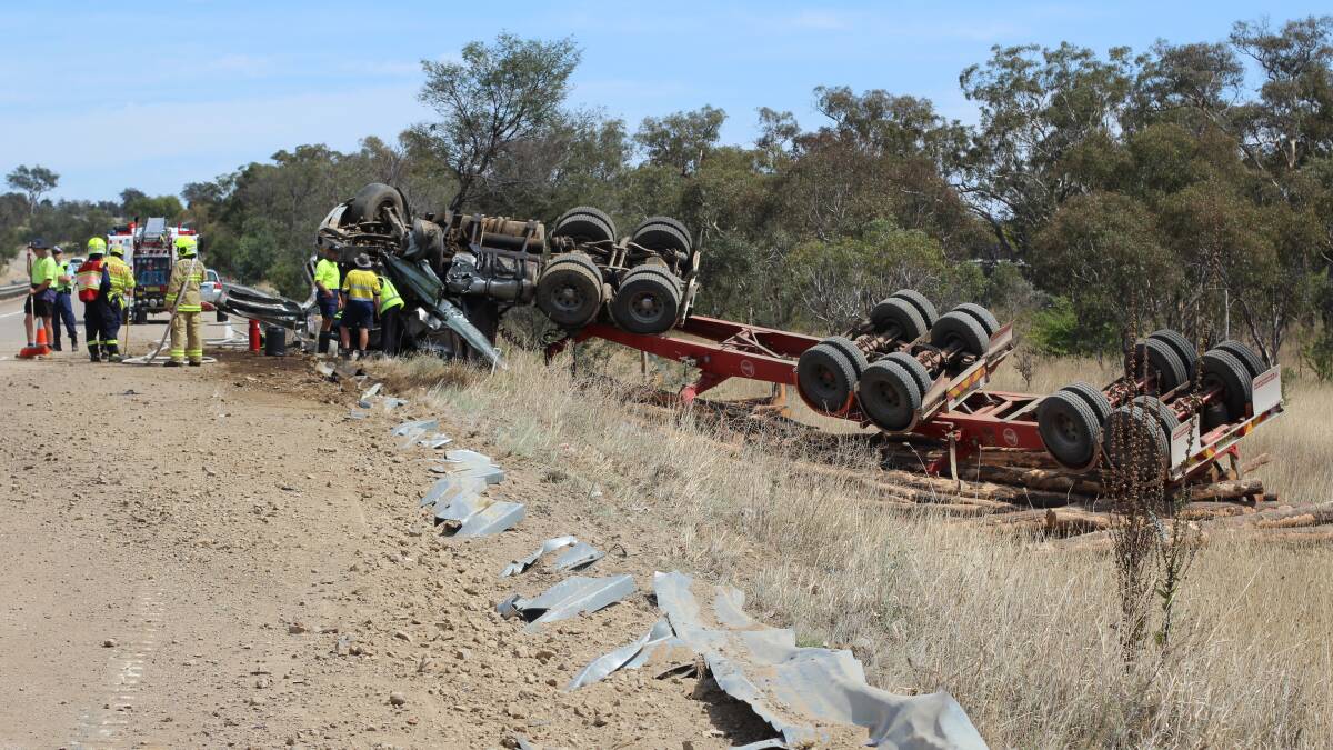 A Tumut man has sustained injuries to his leg after rolling his truck on the Hume Highway. Photo: Jessica Cole. 