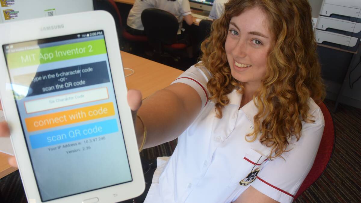 Maitland High School student Lara Jukes, 14, is building an app that organises all community events in one place for the Tech Girl Superhero competition. Picture: Brodie Owen.