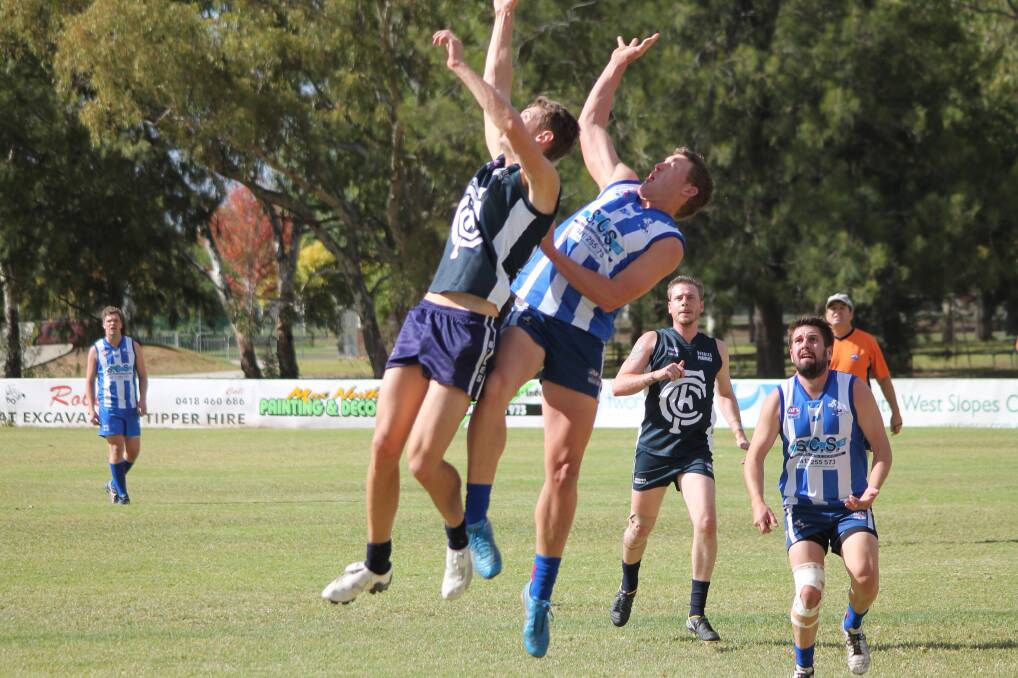 Adam Forth, pictured competing for the ball in last year's elimination semi-final, has been ruled out for the remainder of the Roos' 2016 campaign.