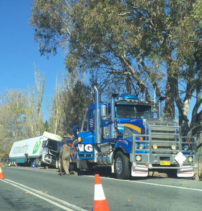Mobile users fined for filming truck crash 