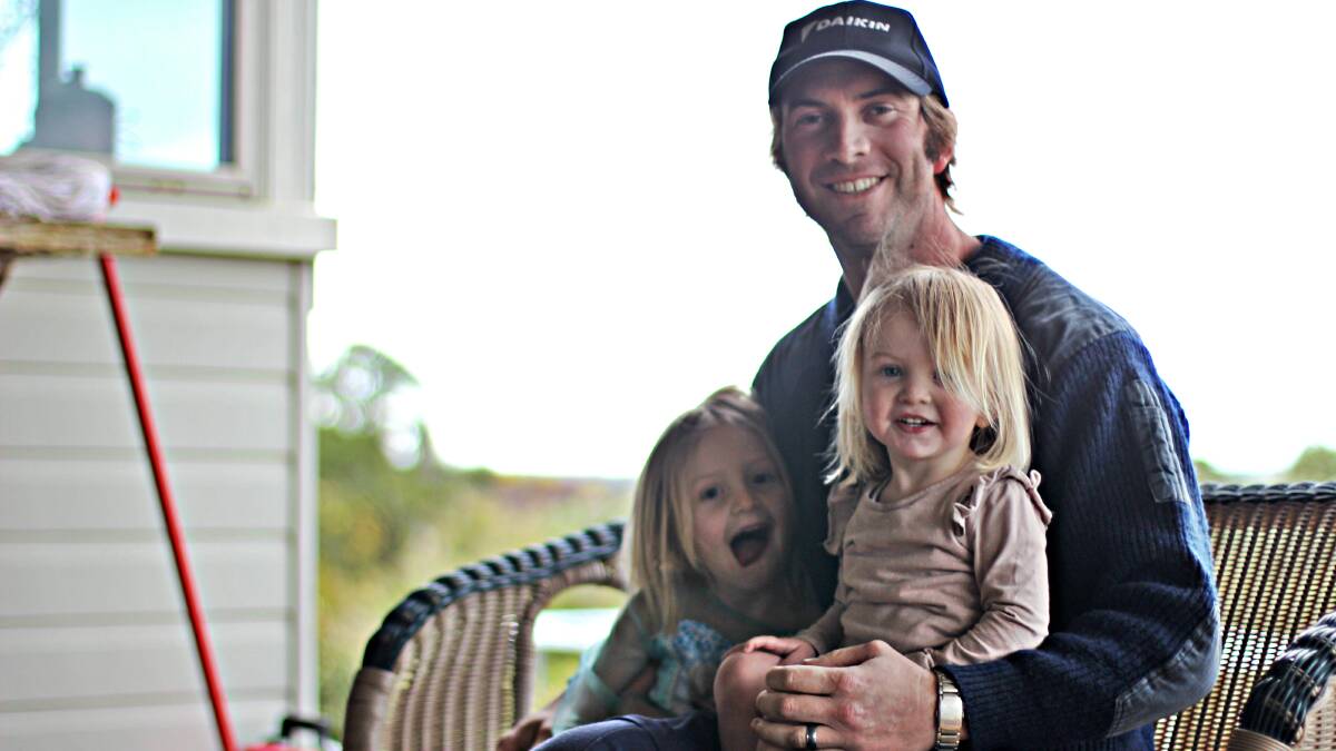 Touie Smith Jnr with daughters Poppy and Tilly at his home in Yass.