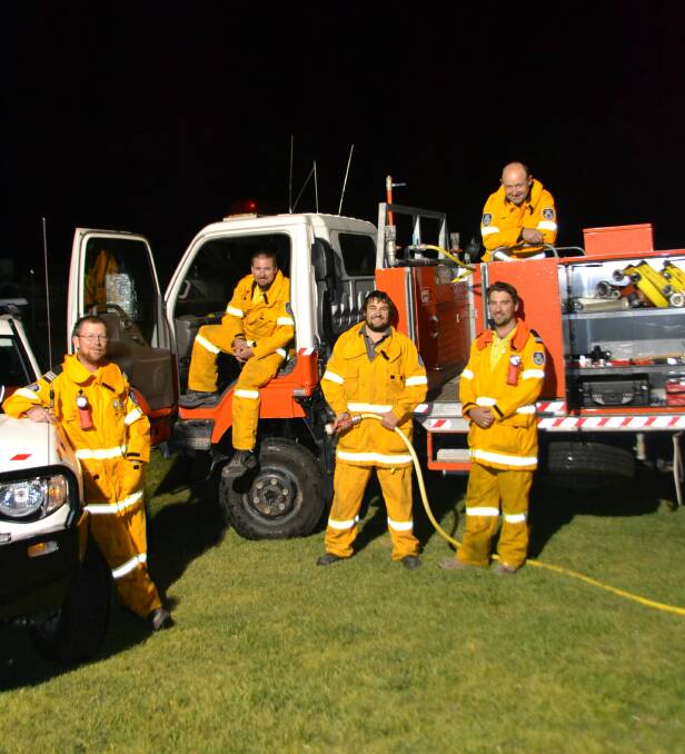 Captain Rodney Gray, Edward Alley, John Eccleston, Rob McLelland (top) and James Alley of Yass Support are prepared for a big summer of bushfires, but they aren't hoping for one. Photo: Oliver Watson.