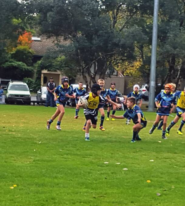 Joey Timmer breaking through the defence heading for the try line. Photo: Supplied.