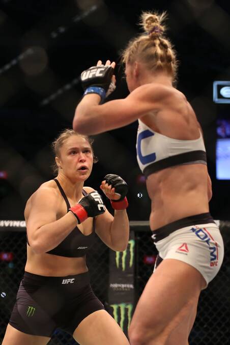  Ronda Rousey of the United States (L) and Holly Holm of the United States compete in their UFC women's bantamweight championship bout during the UFC 193 event at Etihad Stadium on November 15, 2015 in Melbourne, Australia. Pic: Quinn Rooney/Getty Images