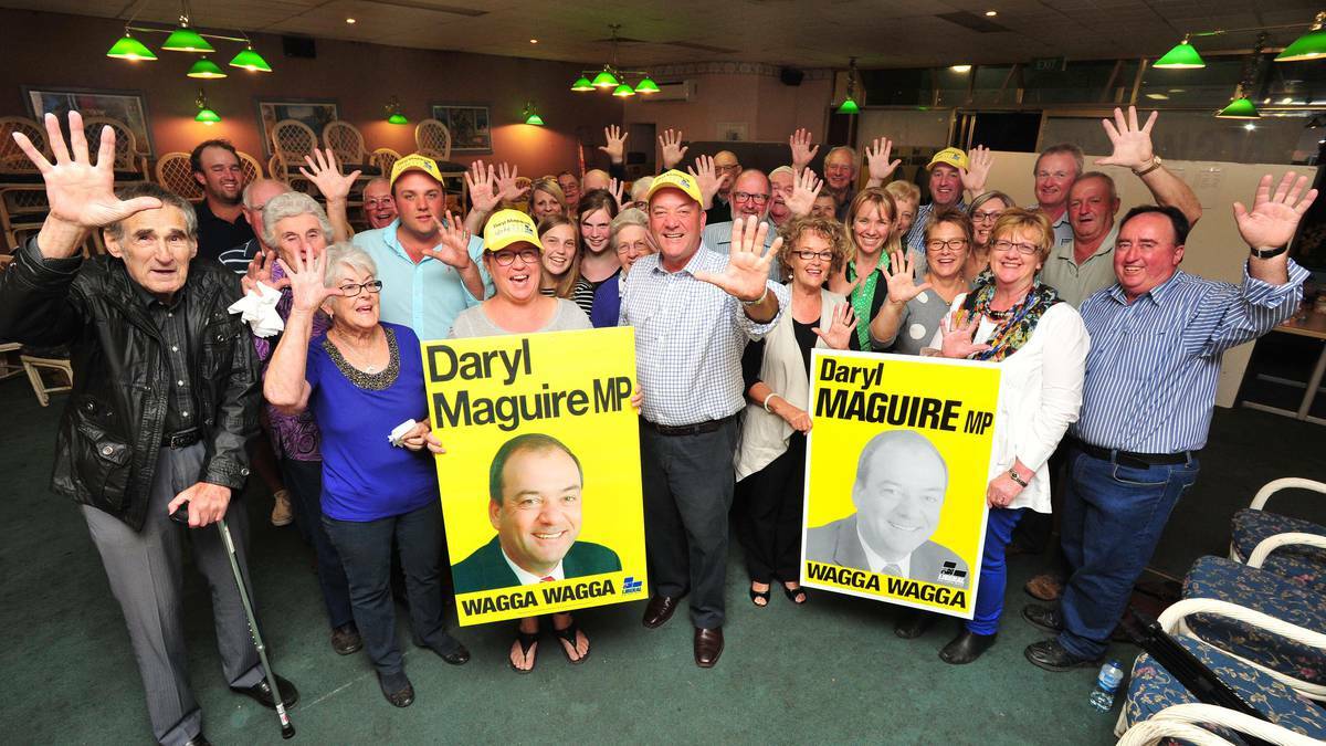 Daryl Maguire celebrates his win with supporters at his campaign office. Picture: Kieren L Tilly