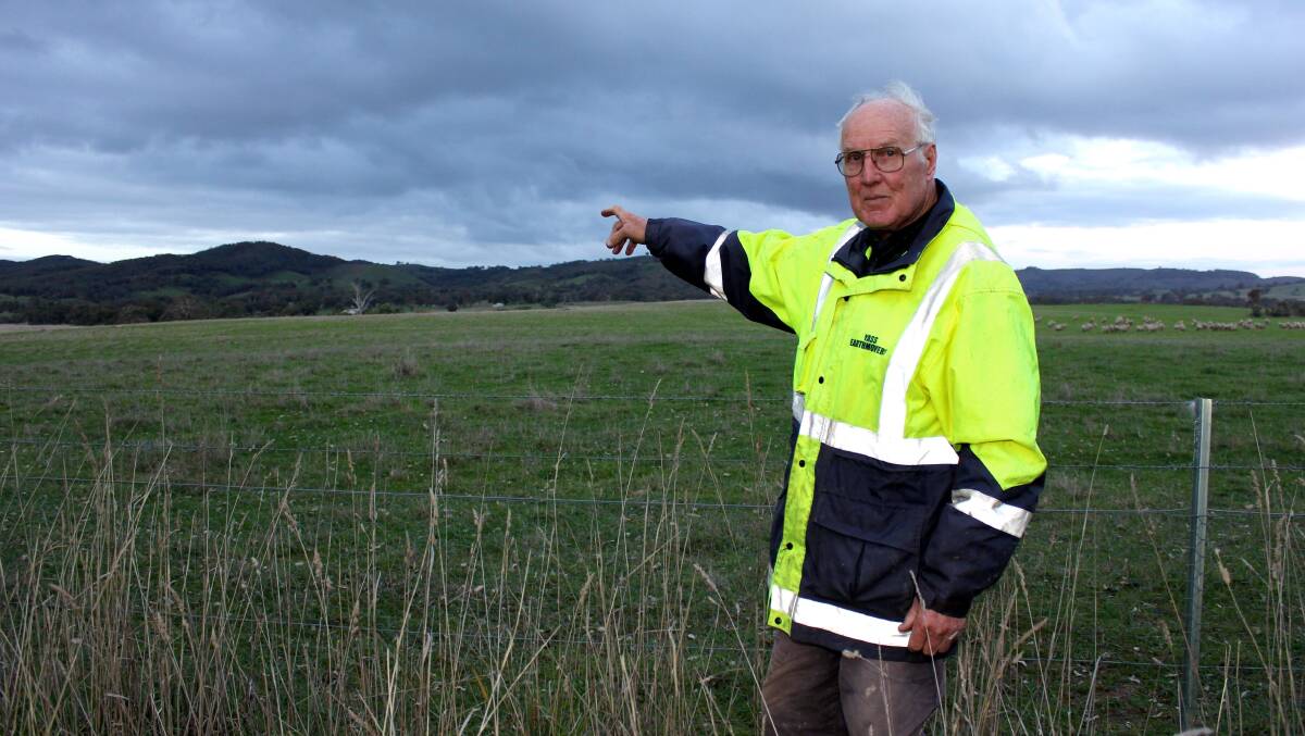 Jim points out the ridges that may soon contain wind turbine towers.