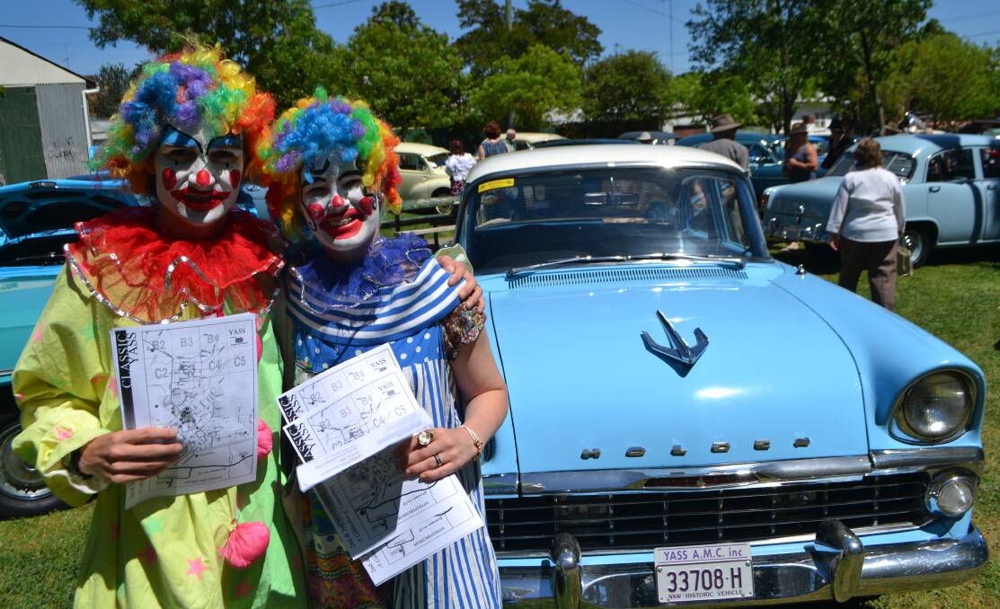 Clowns Jarrett Anthoney and Cassandra Polyak kept crowds entertained during the car show last year. Photo: Oliver Watson.
